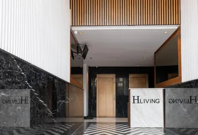 a lobby of a building with a sign that reads billing at Studio Joudia in Casablanca