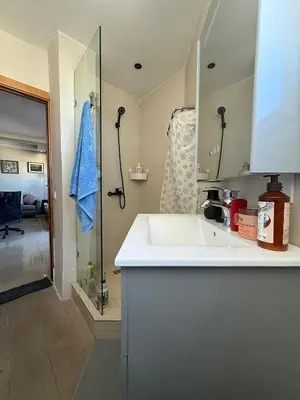 a bathroom with a white sink and a shower at Modern Chic Studio avec Terrace privée et Vue Sans Vis-a-vis et Parking privé in Casablanca