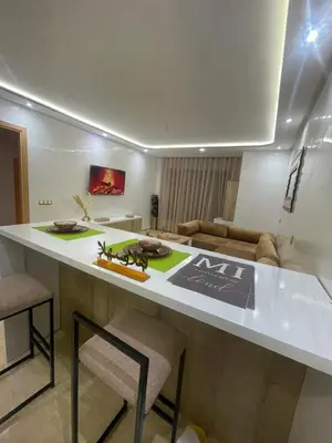 a kitchen with a counter with aarantula on it at Studio Chic & Neuf au Cœur de Bourgogne in Casablanca-Port