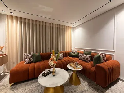 a living room with a couch and a table at Apparently city center in Casablanca