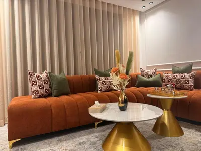 a living room with a couch and a table at Apparently city center in Casablanca