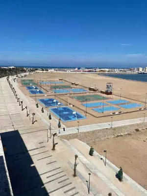 an overhead view of a beach with swimming pools at Cosy Appart au Parc Mohammédia in Mohammedia