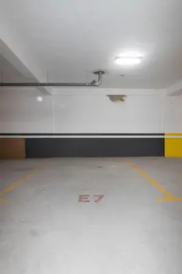 an empty room with a yellow and black stripe on the wall at Piscine Chauffée Salle de Sport Balcon Panoramique in Mohammedia