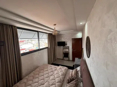 a hotel room with a bed and a window at studio elevator, renovated air-conditioned breakfast in Casablanca