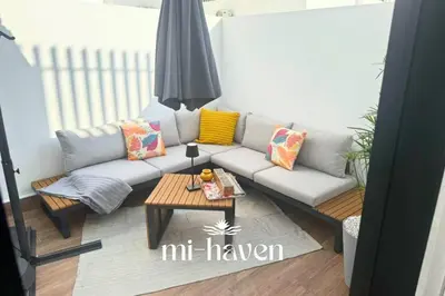 a living room with a couch and a coffee table at Happy - 2 BR - Downtown Casablanca in Casablanca