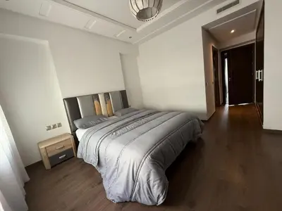 a bedroom with a large bed in a room at Urban Square in Casablanca