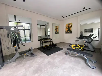 a gym with several treadmills and machines in a room at CFC centre d'affaires - Salle de sport - Wifi in Casablanca