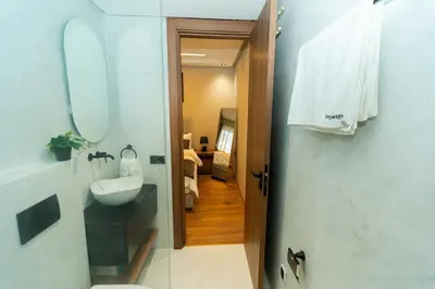 a bathroom with a sink and a mirror at Elegant Studio at 2 Mars Modern, Quiet Convenient in Casablanca