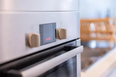 a close up of a microwave oven with a screen at Luxury Apartment Anfaplace Cosy & Design in Casablanca