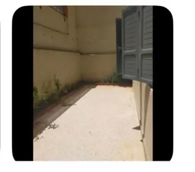 an empty room with a window on the side of a building at Dar Khnata in Temara