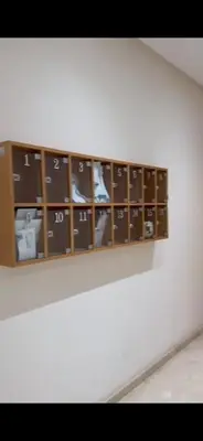 a shelf with many objects in it on a wall at Havre de paix in Rabat
