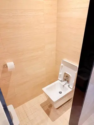 a bathroom with a sink and a toilet at Prestigia Golf City Bouskoura in Bouskoura