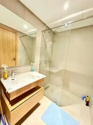 a bathroom with a sink and a shower at Havre de paix chic avec terrasse Maarif Palmier Casablanca in Maarif