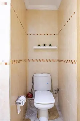 a bathroom with a white toilet in a room at Moderne, 2 CH, Fibre optique, AC Garage Ascenseur in Rabat