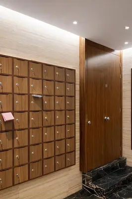 a closet with wooden lockers in a room at Studio design et cosy au centre ville in Casablanca