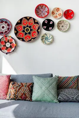 a wall with a bunch of plates on a wall at Charming Moroccan Studio, Breathtaking View in Casablanca
