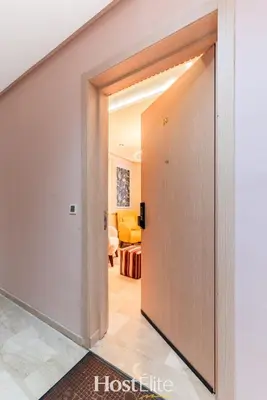 a hallway with a door leading to a bedroom at Give Essalam Design & Patio & Clim & 2P in Casablanca