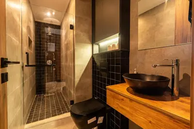 a bathroom with a sink and a shower at Résidence Happy Living in Casablanca
