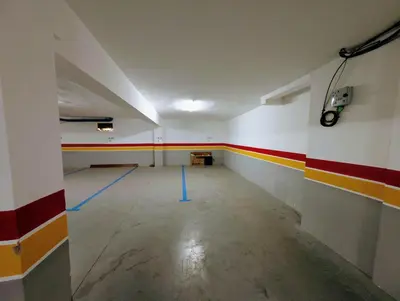 an empty room with red yellow and white walls at Pool view apartment, beach access, nature & quiet in Mansouria