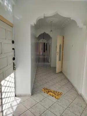 a hallway with a rug on the floor in a room at Val Fleurie in Casablanca