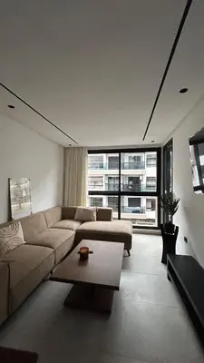 a living room with a couch and a table at Central Casablanca Cozy Home in Casablanca