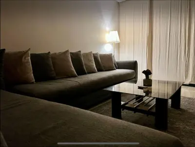 a living room with a couch and a coffee table at Anfa City in Casablanca