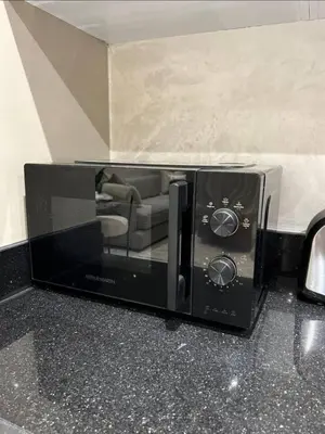 a toaster oven sitting on top of a counter at MR9-03 Nice corner in the heart of Casa in Casablanca