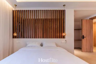 a bedroom with a large white bed with two pillows at Exceptional Private Room 1 SandRose in Casablanca