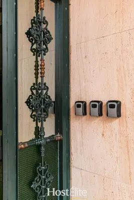 a cross on the side of a building with a window at Exceptional Private Room 1 SandRose in Casablanca