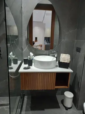 a bathroom with a sink and a mirror at Elegance Comfort Terrace in the heart of Princesses in Maarif