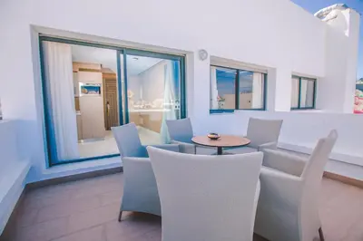 a dining room with a table and chairs at DownTown Hotel Maârif Casablanca By TSA in Casablanca