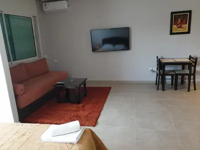 a living room with a couch and a table at Residence Davos Rabat in Rabat