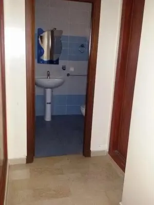 a bathroom with a sink and a toilet at Agdal Two-Bedroom Apartment 2 Minutes from Agdal Train Station in Rabat