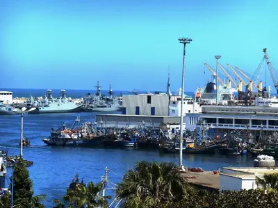 a group of boats docked in a harbor at Hôtel Central in Casablanca