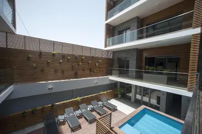 an image of a house with a swimming pool at Ocean Park Hotel, Premium Suites & Wellness in Casablanca