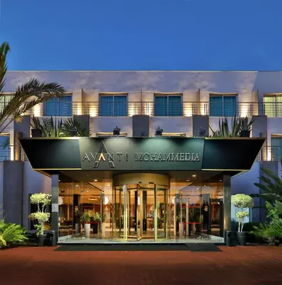 an apartment building with a sign that reads at art miamianguardlabel at Avanti Mohammedia Hotel in Mohammedia