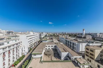 an aerial view of a city with buildings at Prince de Paris in Casablanca