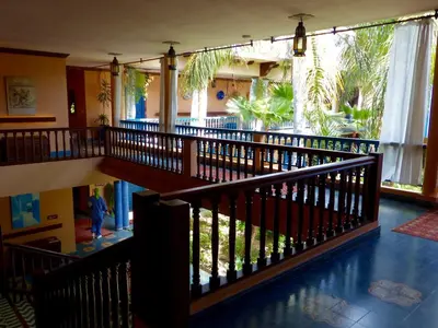 a staircase in a building with a view of a yard at La Villa Mandarine in Rabat