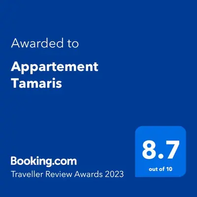 a blue screen with the text awarded to agreement tamaris at Appartement Tamaris couple mariés in Tamaris