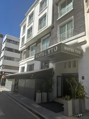 a hotel with a sign on the front of it at Yto boutique Hotel in Casablanca
