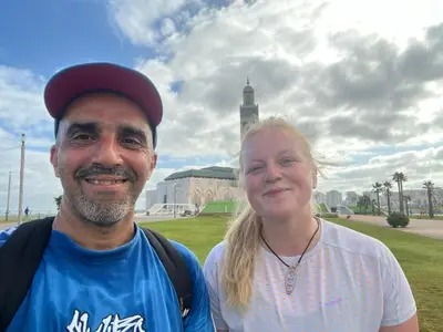 a man and a woman standing in a park at Riad Nabila in Casablanca