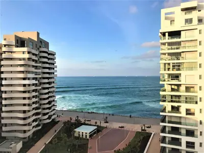 a view of the ocean between two buildings at Belle-Vue sur Mer à Casa-Marina 9éme étage in Casablanca