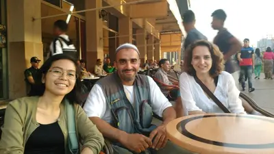 a group of three people sitting at a table at Faridi vacancy appartment in Casablanca