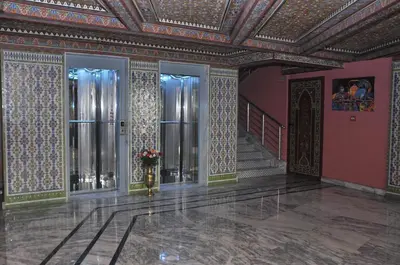 a room with ornate ceilings and doors in a building at HOTEL DELTA ATLAS in Casablanca