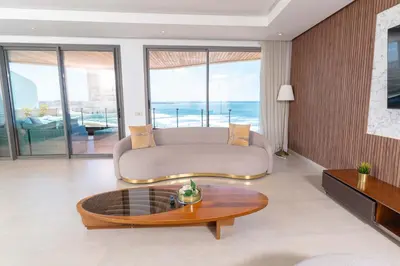 a living room with a couch and a coffee table at KEEP CALM AND THINK OF THE SEA, MARINA!! in Casablanca