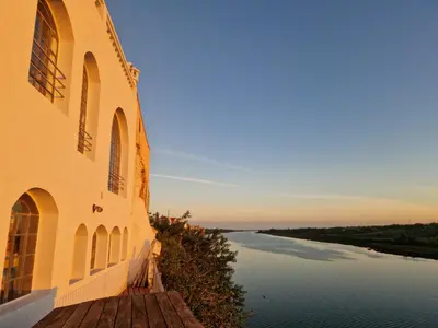 a building with a view of a river at L'Oum Errebia in Azemmour
