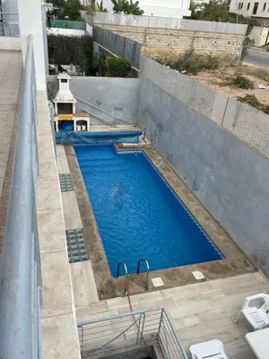 an overhead view of a swimming pool on a building at Luxury Villa at Ain-Diab in Casablanca