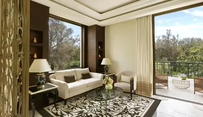 a living room with a couch and a table at The Ritz-Carlton Rabat, Dar Es Salam in Rabat