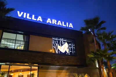 a building with a sign that reads villa arifa at Aralia Boutique Hôtel in Rabat