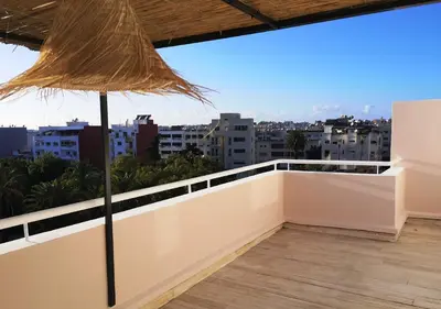 a balcony with a view of a city at LAU 09 Studio Terrasse in Rabat